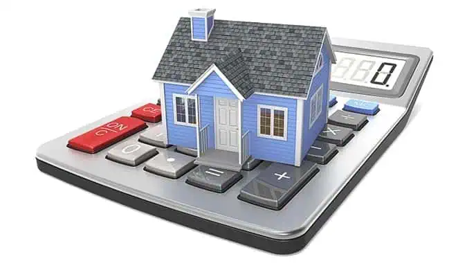 Illustration av ett hus på en kalkylator för flyttkostnadsberäkning.